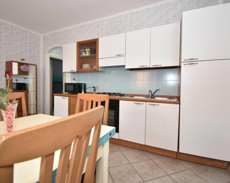 Appartement Le Residenze Itaca à Porto Pozzo Extérieur photo